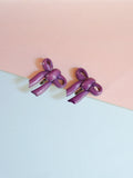 1940s Celluloid bow earrings