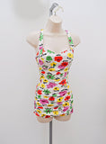 1950s Jantzen white cotton ruched swimsuit with yellow/green/red/purple print