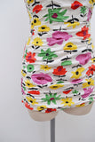 1950s Jantzen white cotton ruched swimsuit with yellow/green/red/purple print