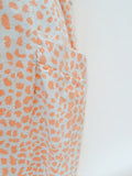 1950s Orange leopard print cigarette pants - Medium Large