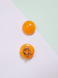1940s Marbled mango bakelite domed clip on earrings
