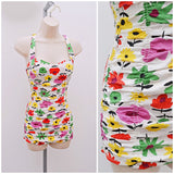 1950s Jantzen white cotton ruched swimsuit with yellow/green/red/purple print